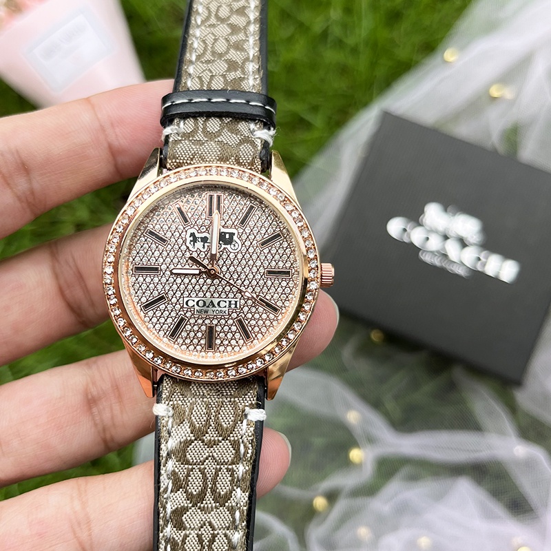 Coach reloj dorado online mujer