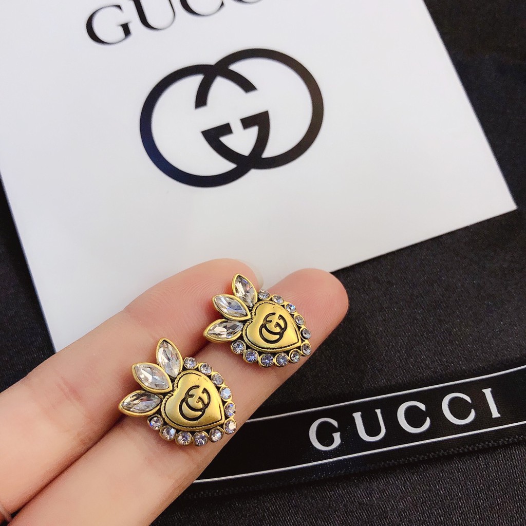 Aretes best sale gucci oro