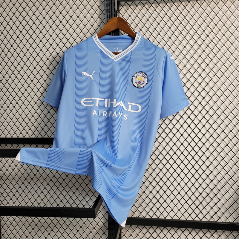 Camiseta Manchester City 2023-2024 local azúl versión fan